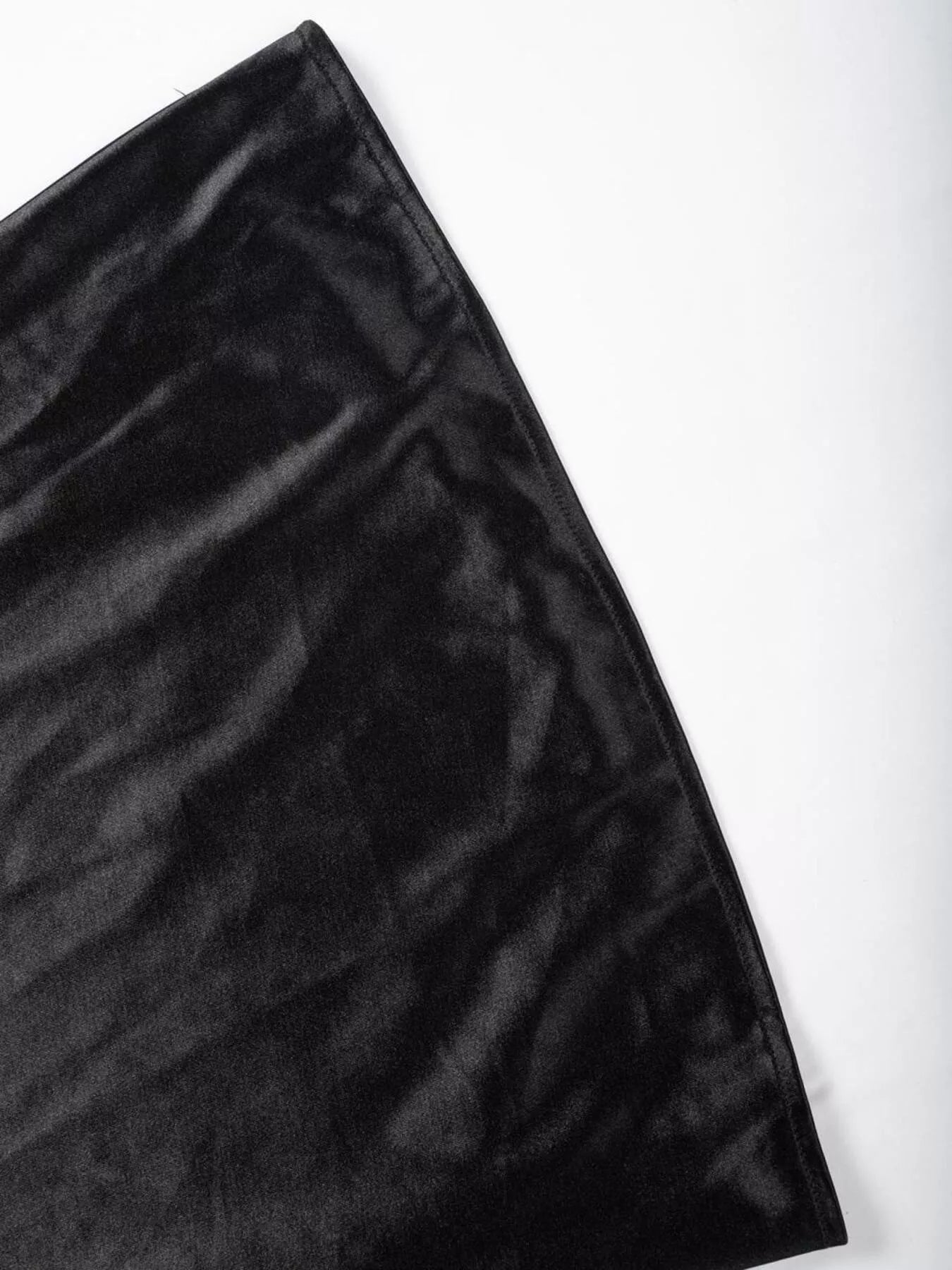 Black fabric with a subtle pattern on a white background