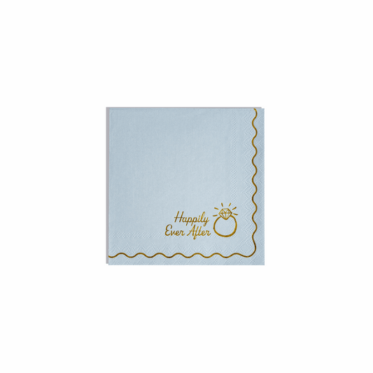 Light blue square paper napkin with scalloped edges and gold Happily Ever After text next to a ring illustration.