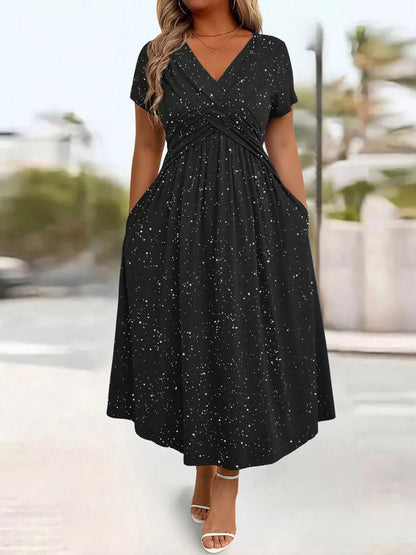 Black dress with star pattern worn by a person outdoors