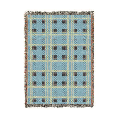 A rectangular woven throw blanket with a light blue plaid pattern, cream and brown stripes, and fringed edges, shown flat against a white background.