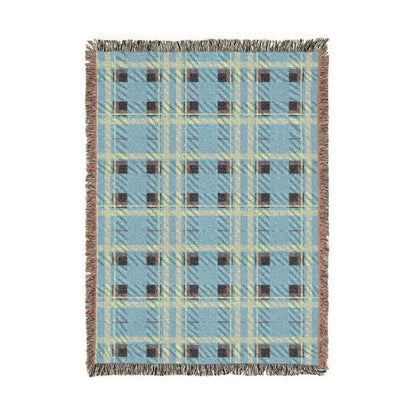 A rectangular woven throw blanket with a light blue plaid pattern, cream and brown stripes, and fringed edges, shown flat against a white background.