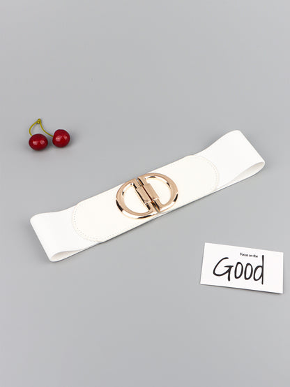 White belt with a gold buckle on a gray background