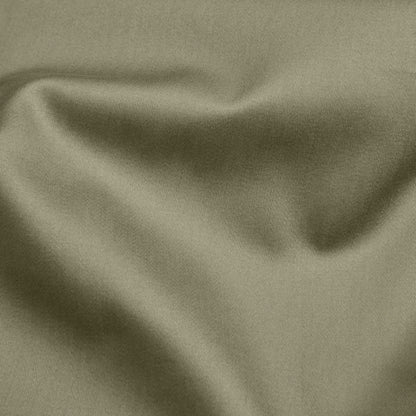 Close-up of olive green fabric with folds