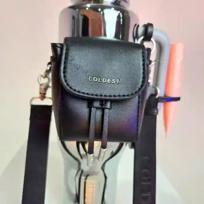 Coldest water bottle with a black mini backpack and squeeze holder, featuring a key hanger and mint box.