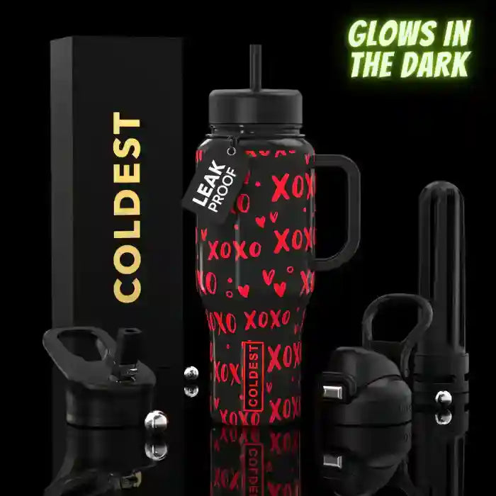 Black water bottle with red heart patterns, 'XOXO' text, and 'Coldest' branding on a black background.