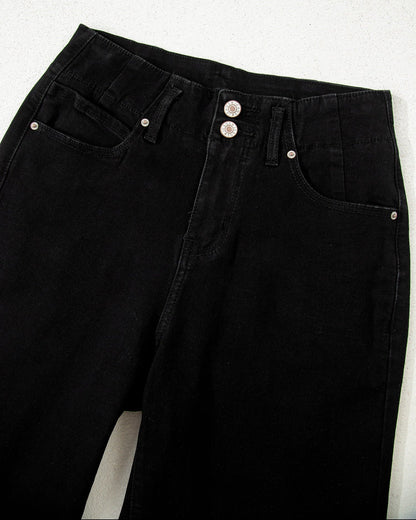 Black pants with button details on a white background