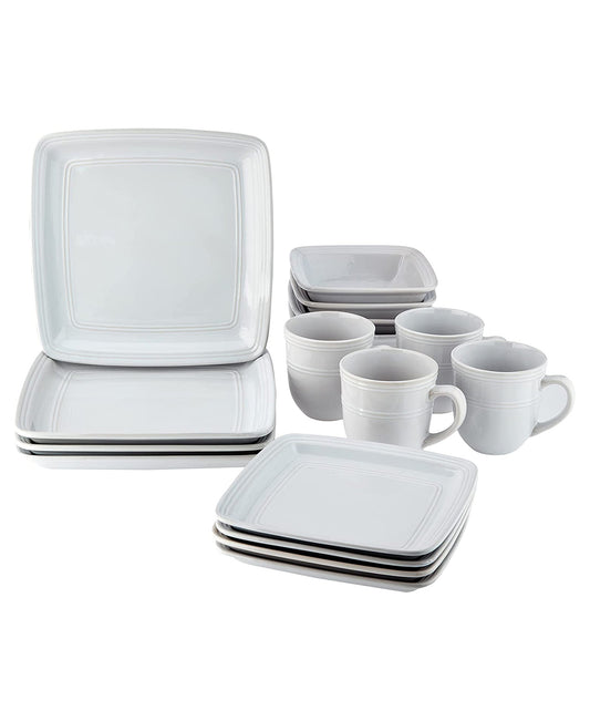 A white stoneware dinnerware set including square plates, stacks of plates, and matching handled cups, arranged on a clean white background.