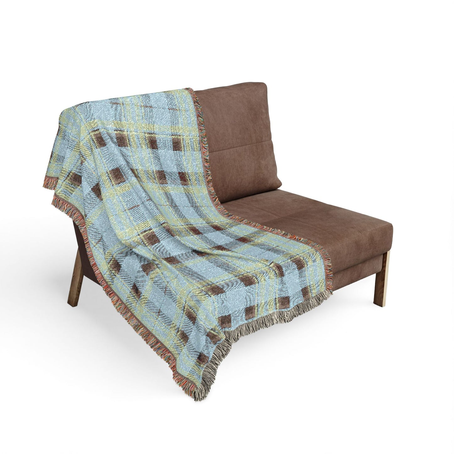 A brown upholstered lounge chair with a light blue, brown, and yellow plaid throw blanket draped over it, shown on a plain white background.