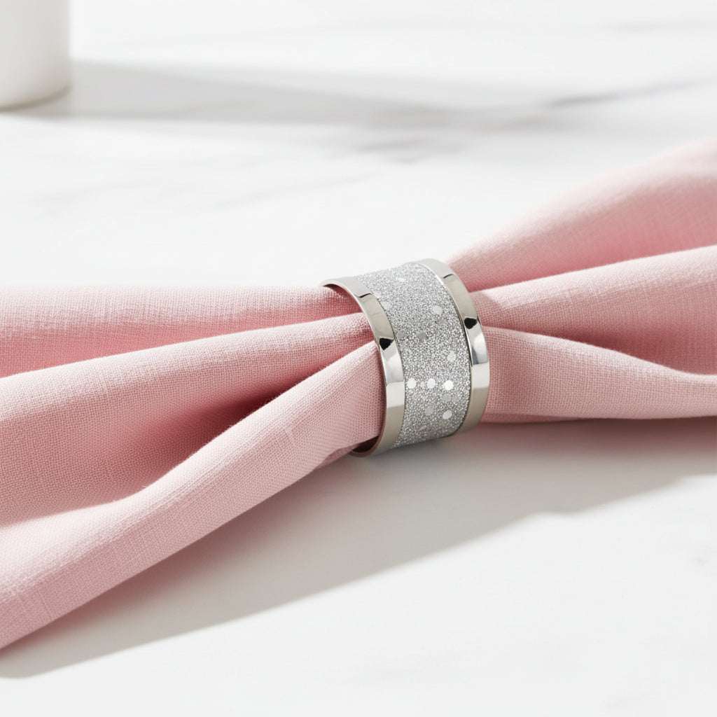 A wide silver band ring featuring a textured, glittery silver inlay between polished silver sides, shown on a clean white background.