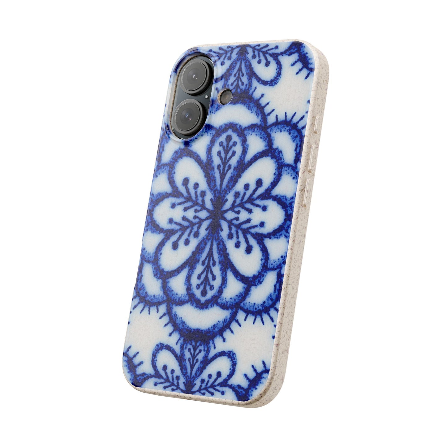 A phone case featuring a blue and white floral mandala pattern on a textured white background, with a natural cork edge.