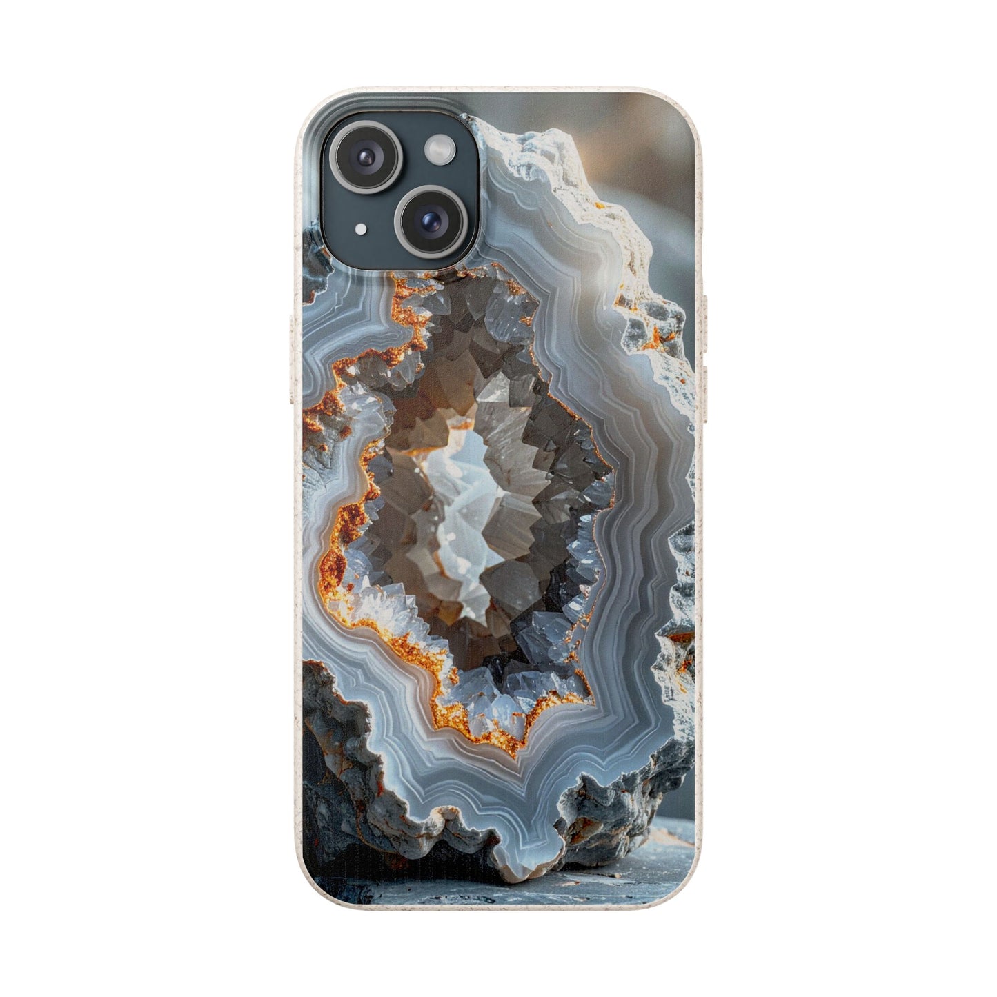 A clear iPhone case featuring a highly detailed geode and agate crystal pattern with concentric rings of gray, white, brown, and orange, shown on a plain white background.