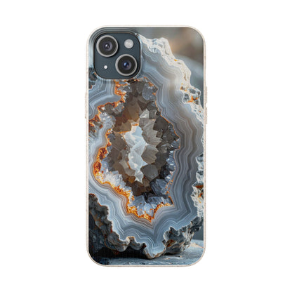 A clear iPhone case featuring a highly detailed geode and agate crystal pattern with concentric rings of gray, white, brown, and orange, shown on a plain white background.