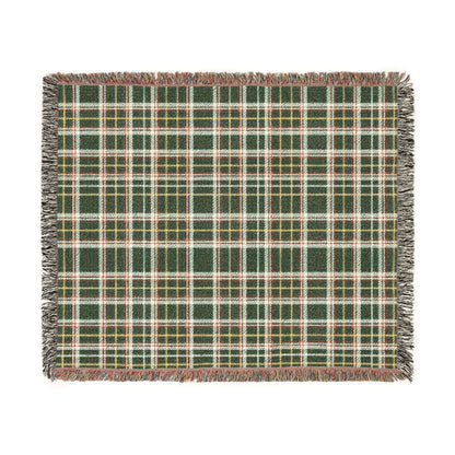 A square woven throw blanket with a green, red, white, and yellow plaid pattern and fringed edges, shown flat against a white background.