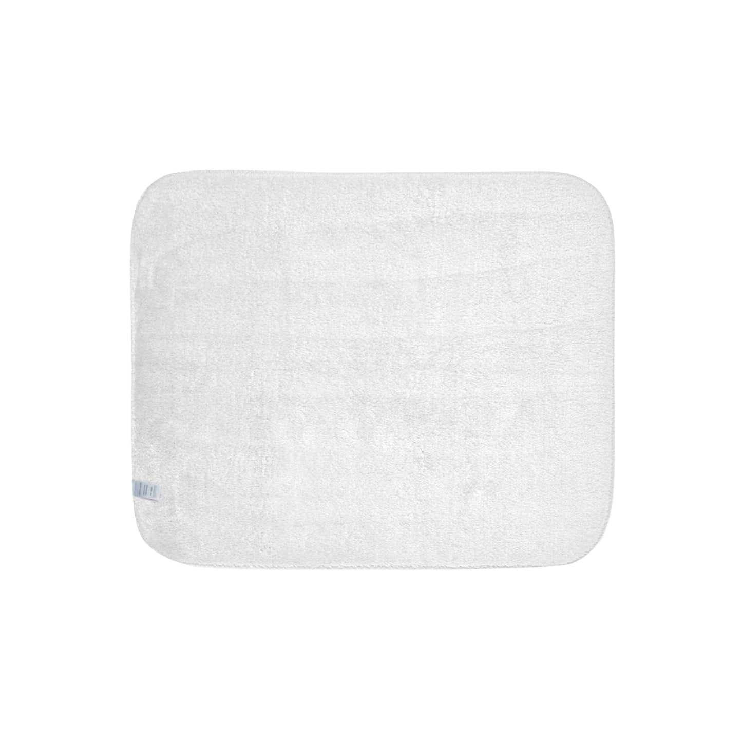Rectangular white bath mat on a white background