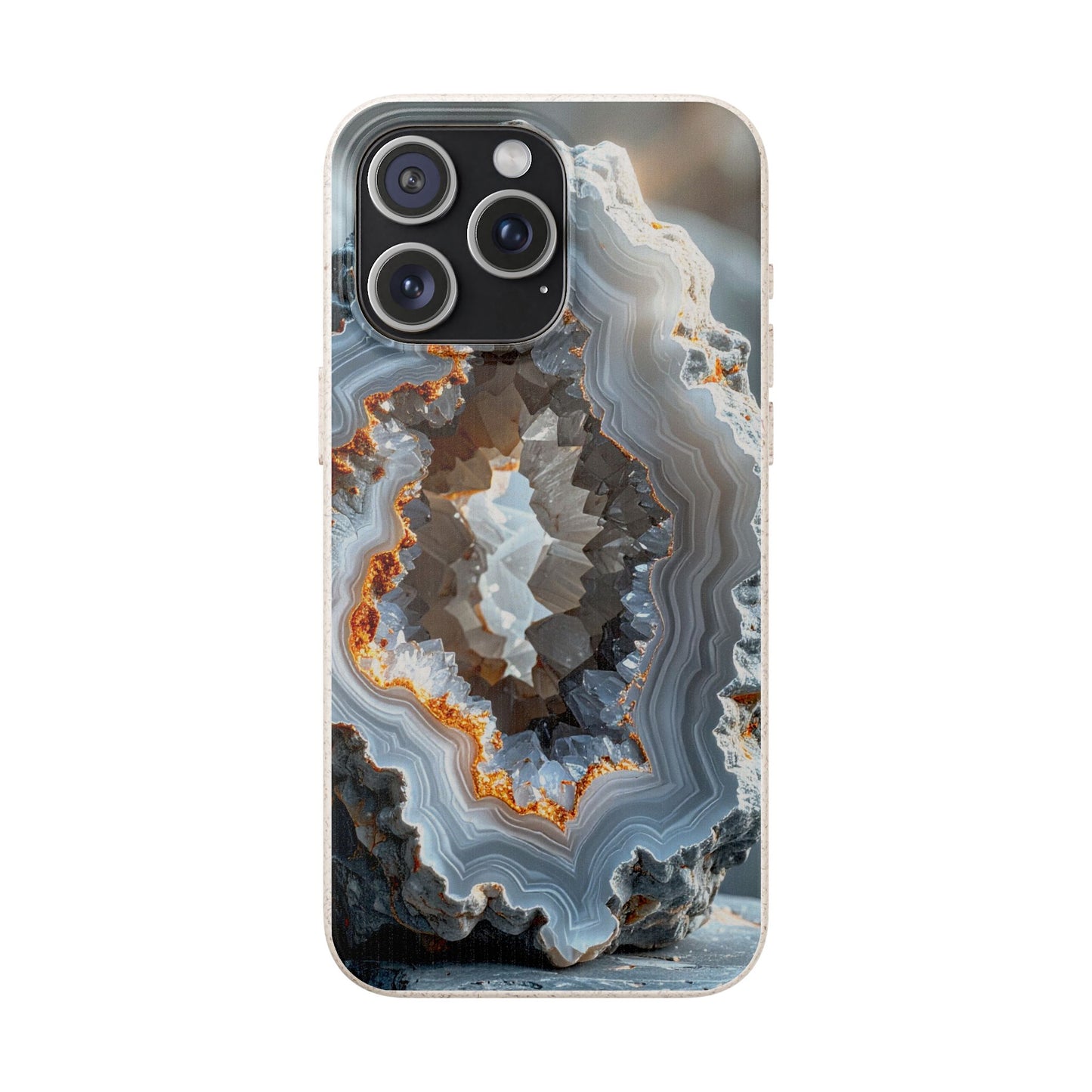 A clear smartphone case featuring a detailed geode and agate stone pattern with gray, white, brown, and orange bands, shown on a phone against a plain white background.