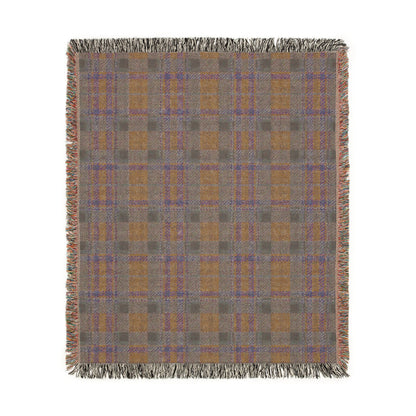 A square woven throw blanket with a plaid pattern in taupe, mustard yellow, and muted blue, finished with fringed edges on a plain white background.