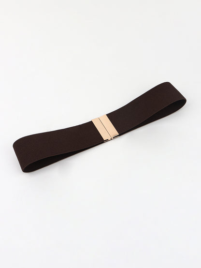 Brown belt with a gold buckle on a white background