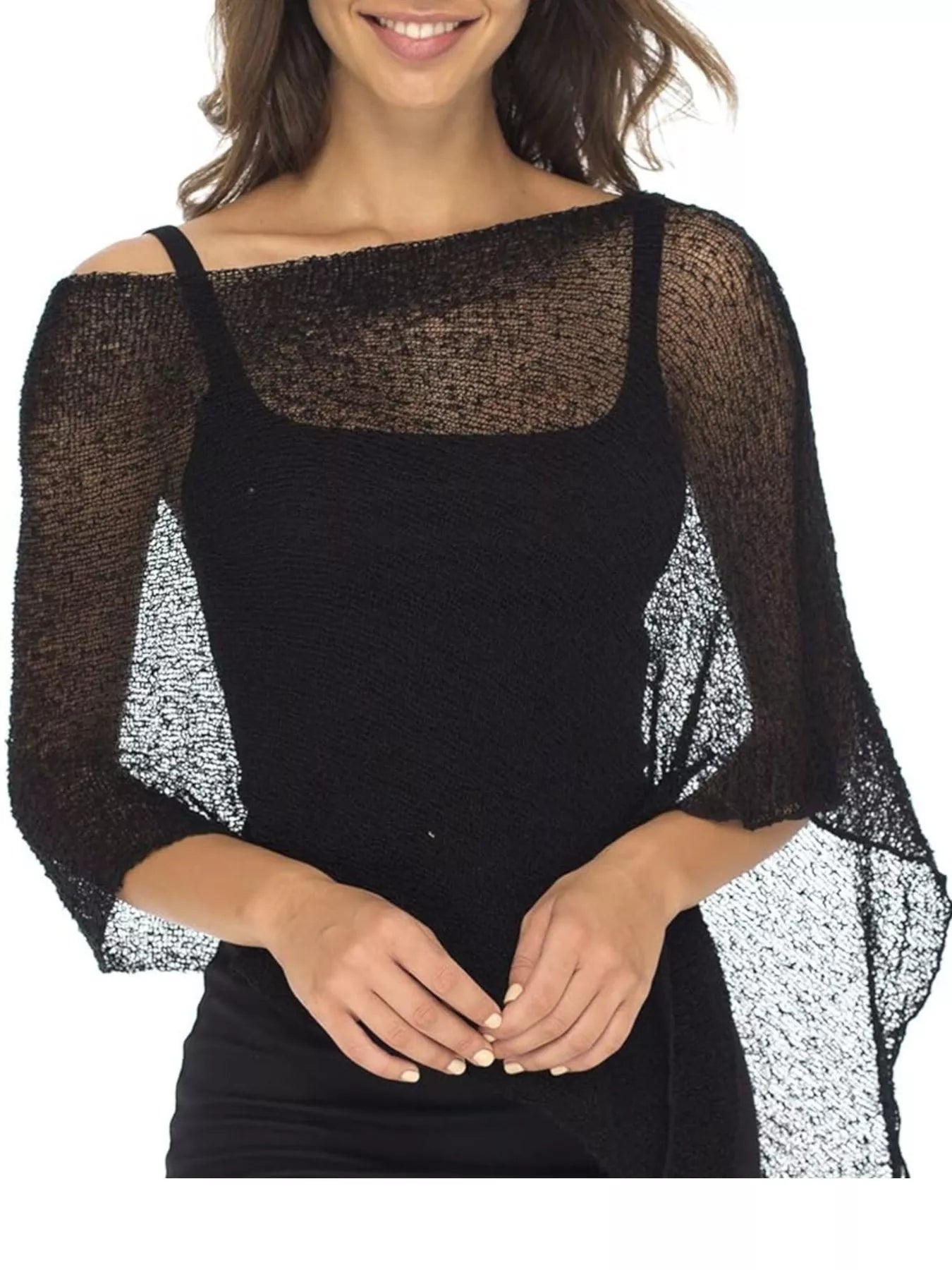 A woman wearing a black off-the-shoulder knit top with sheer, wide three-quarter sleeves and textured side panels, shown against a plain white background.