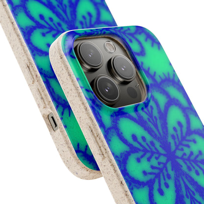 A close-up of a smartphone case with a blue and green floral pattern and a textured beige border, shown on a white background.