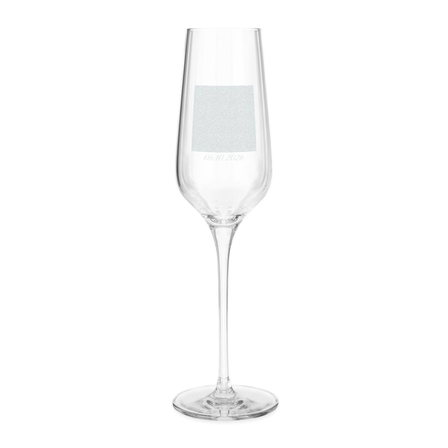 A clear glass champagne flute with a square silver glitter band and faint personalized text near the base, shown on a plain white background.