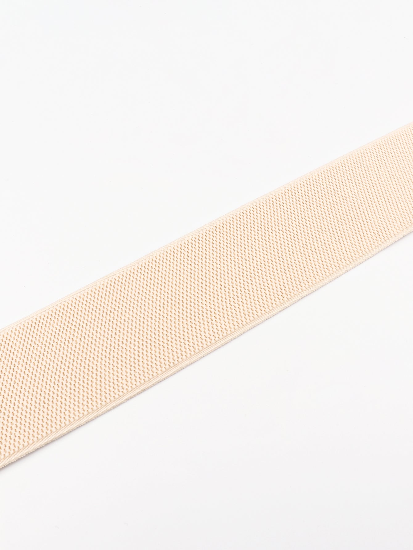 Beige woven belt on a white background
