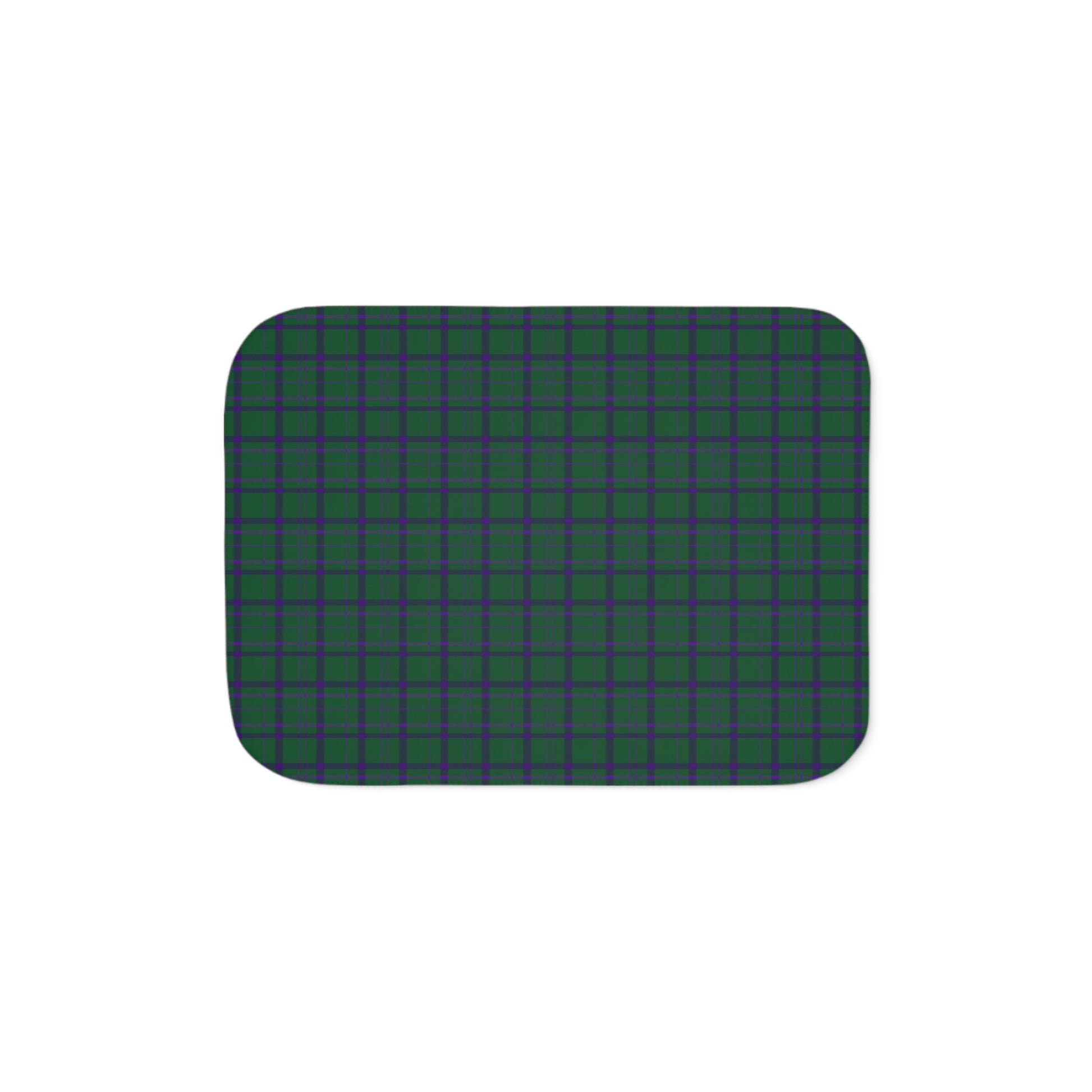 A rectangular mat with rounded corners, featuring a dark green and black plaid pattern, shown against a plain white background.