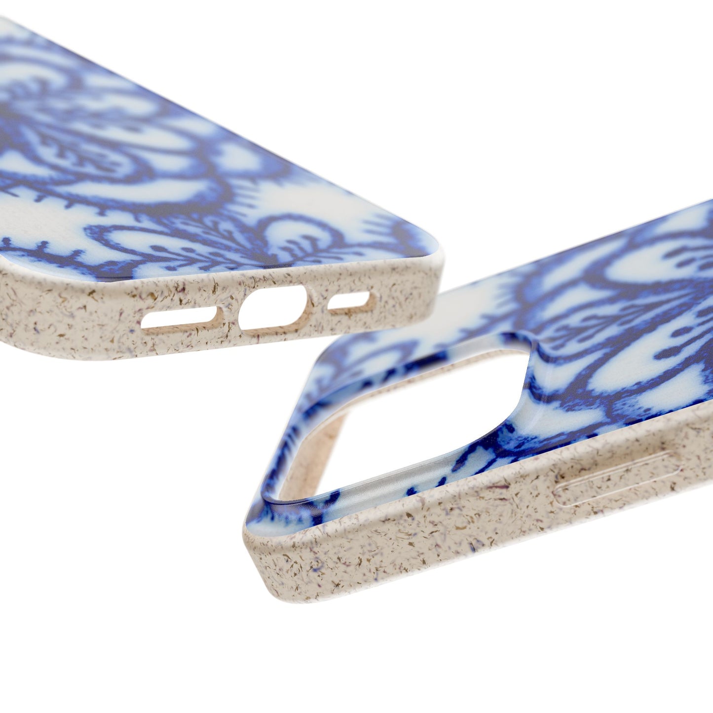 Close-up of a phone case with a blue floral pattern on a white background and a speckled beige textured edge, shown from multiple angles on a white background.