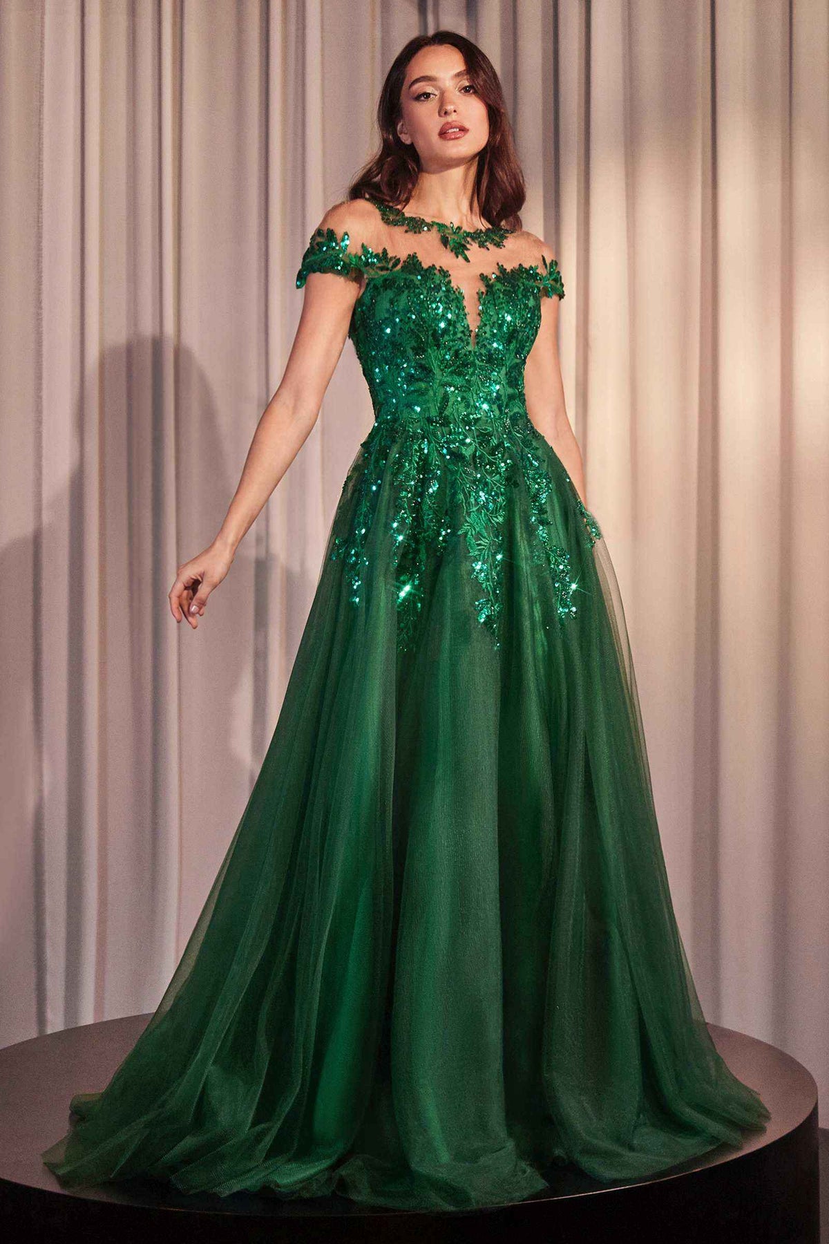 Andrea & Leo A1475 emerald green A-line gown with floral appliqué, illusion neckline and a full tulle skirt.