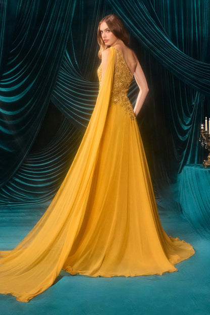 Back view of Andrea & Leo A1495 marigold gown with asymmetrical neckline and long chiffon cape trailing behind.