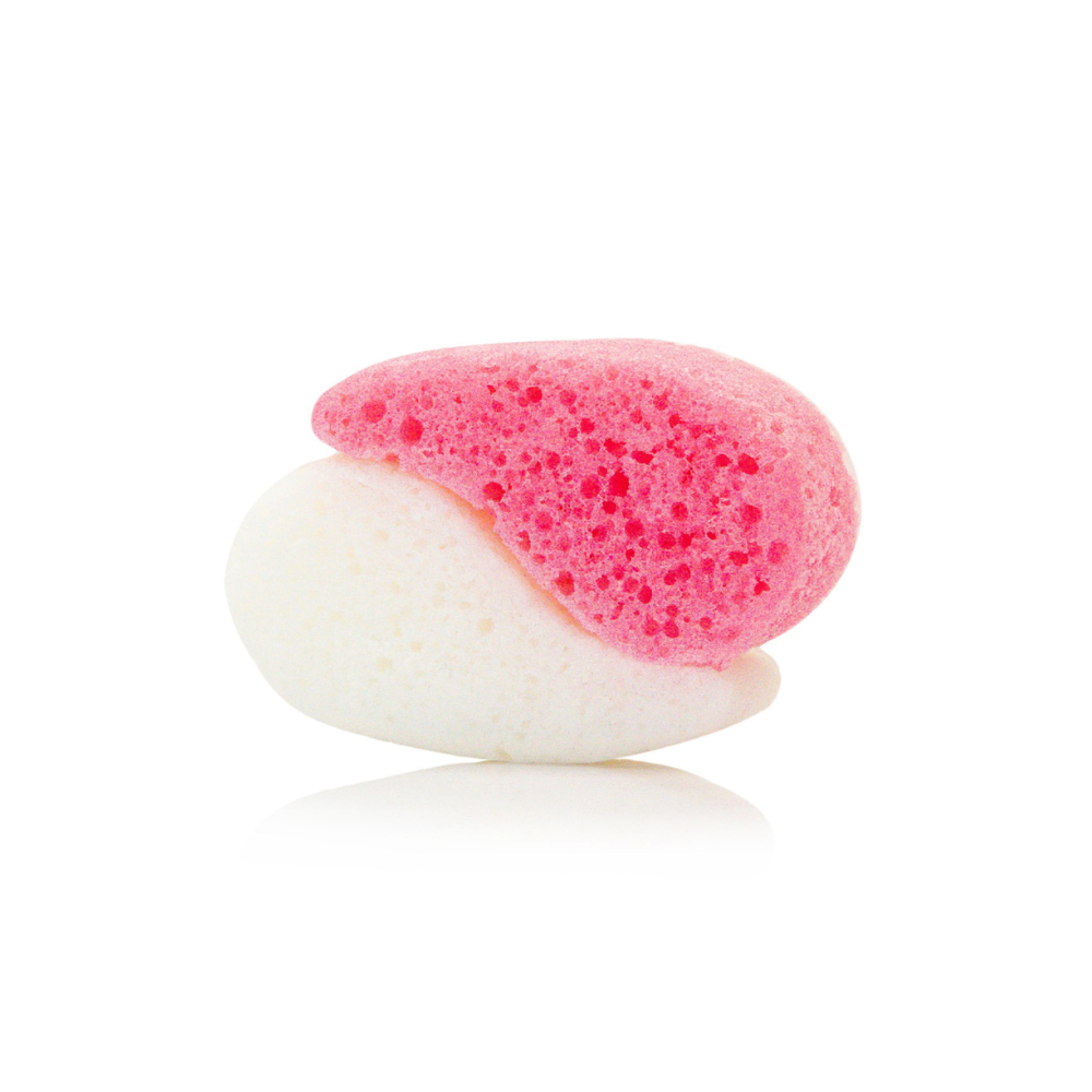 Pink and white bath bomb on a white background