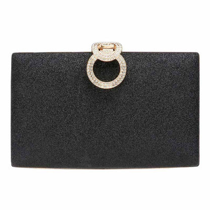 Black clutch bag with a decorative ring on a white background