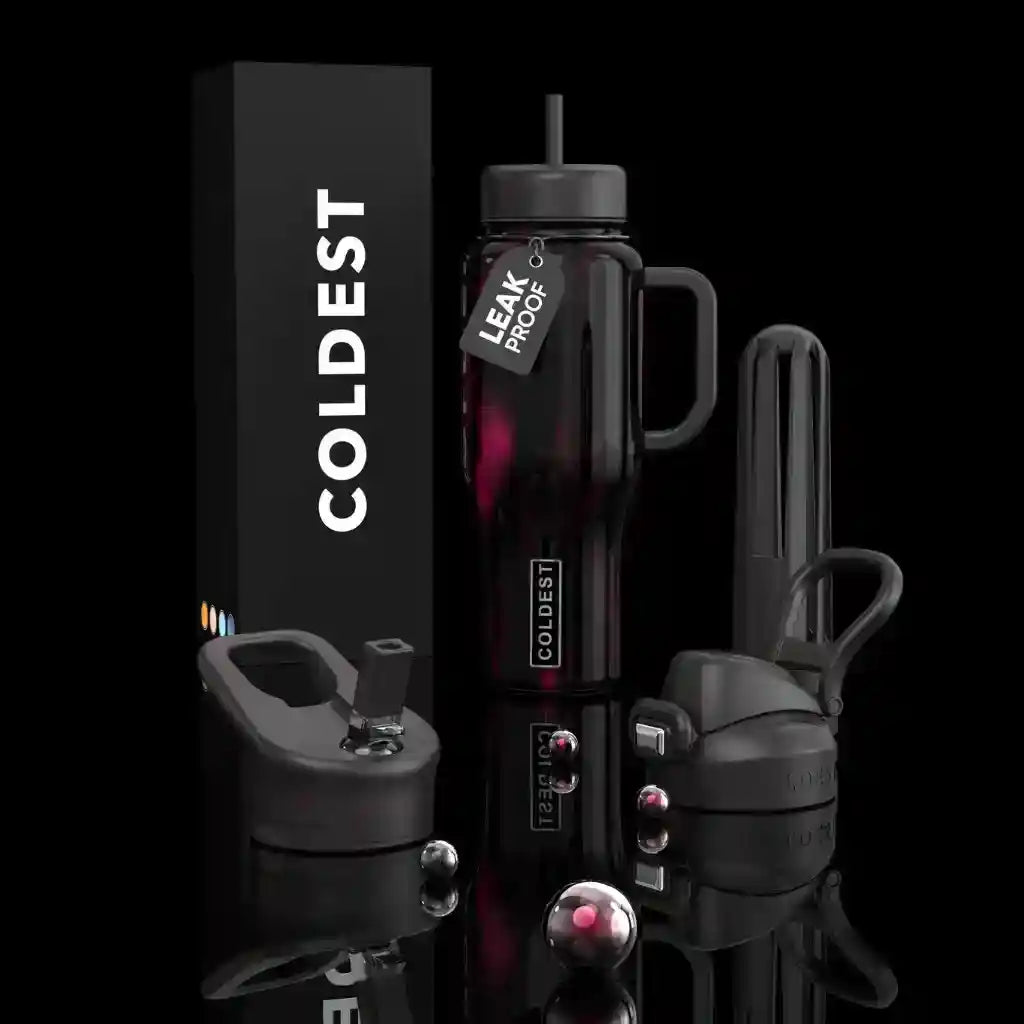 Black insulated mug with 'COLDEST' branding on a reflective surface.