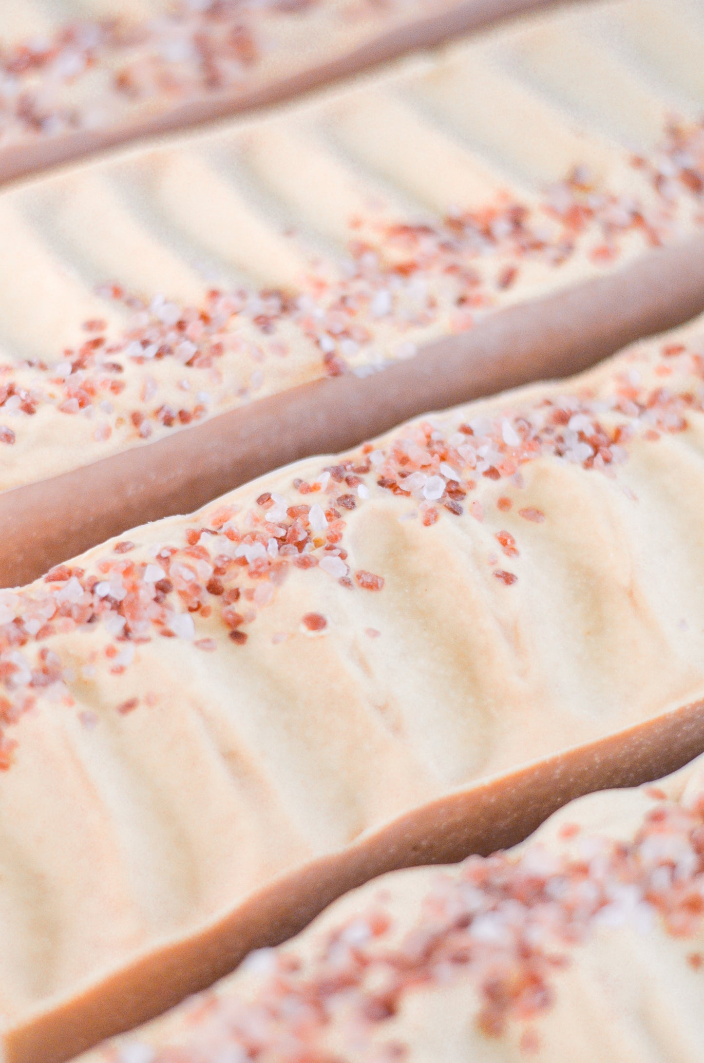 Close-up of bread with pink salt sprinkles on a baking tray