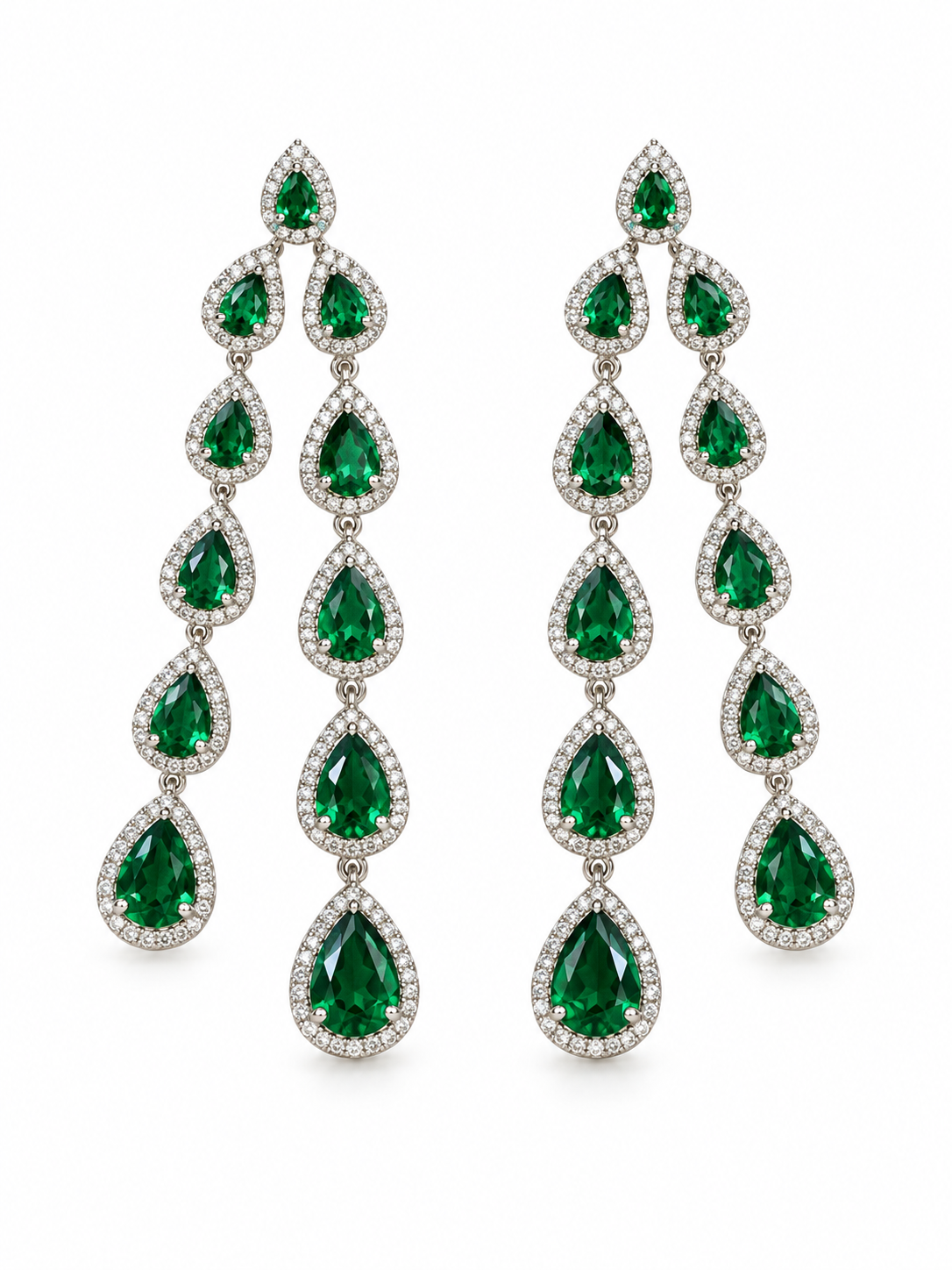 Emerald green drop earrings on a white background