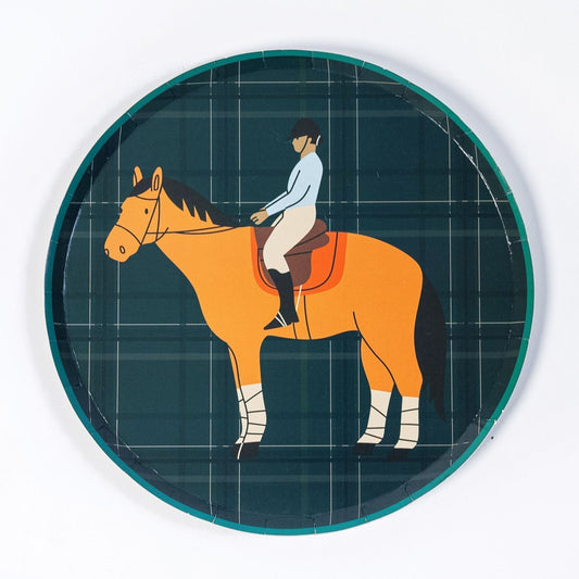 Round paper plate with a green plaid pattern featuring an illustration of a rider on a tan horse.