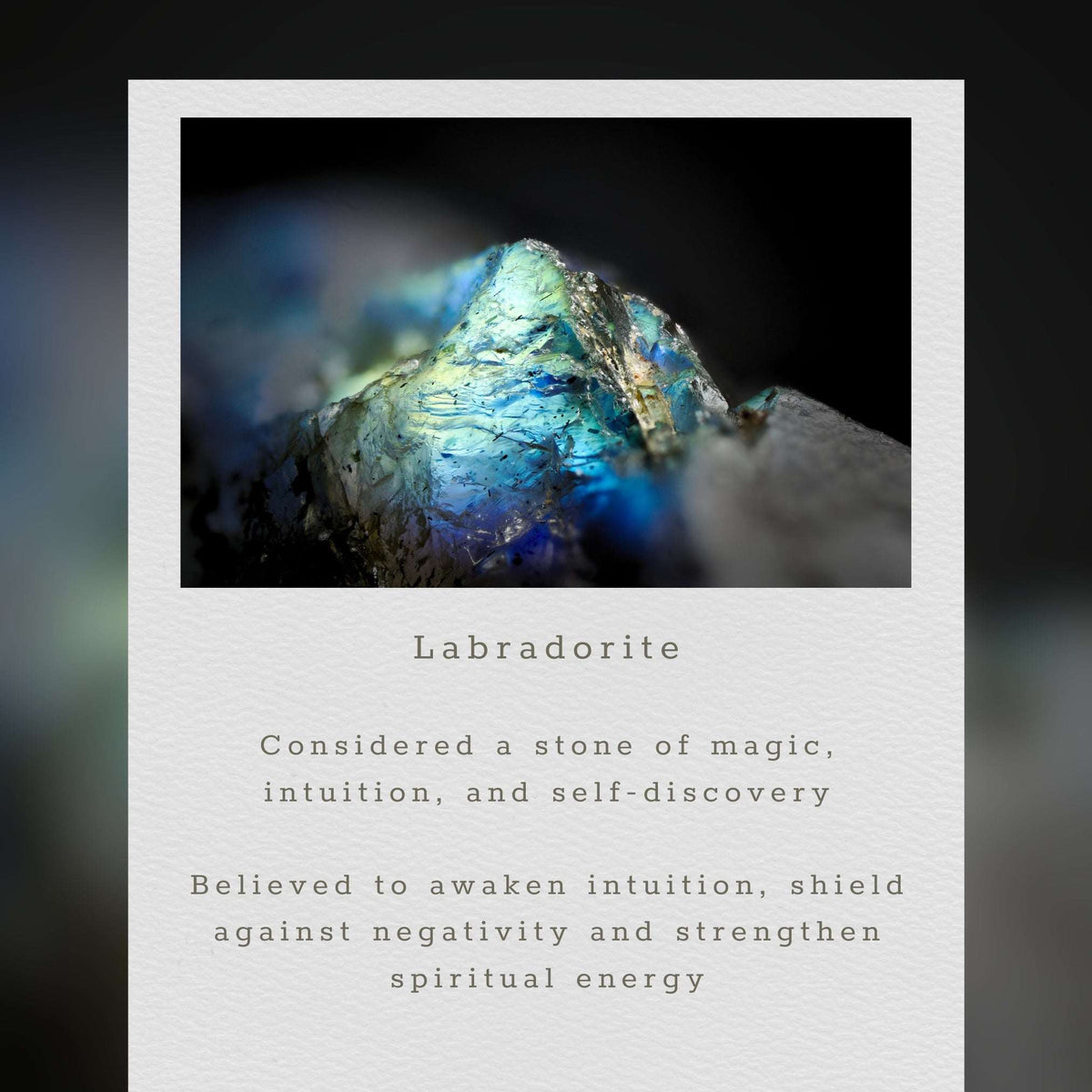 Close-up of a Labradorite stone with descriptive text about its properties.