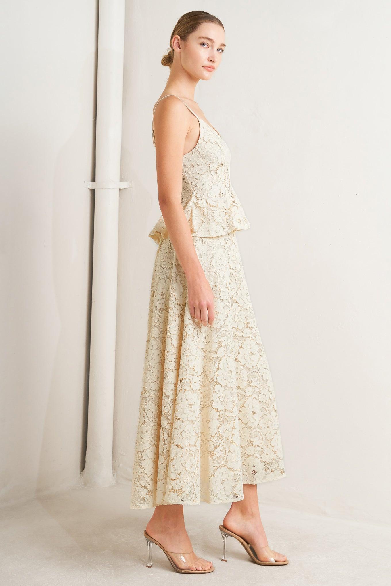 Woman wearing a floral dress against a white background