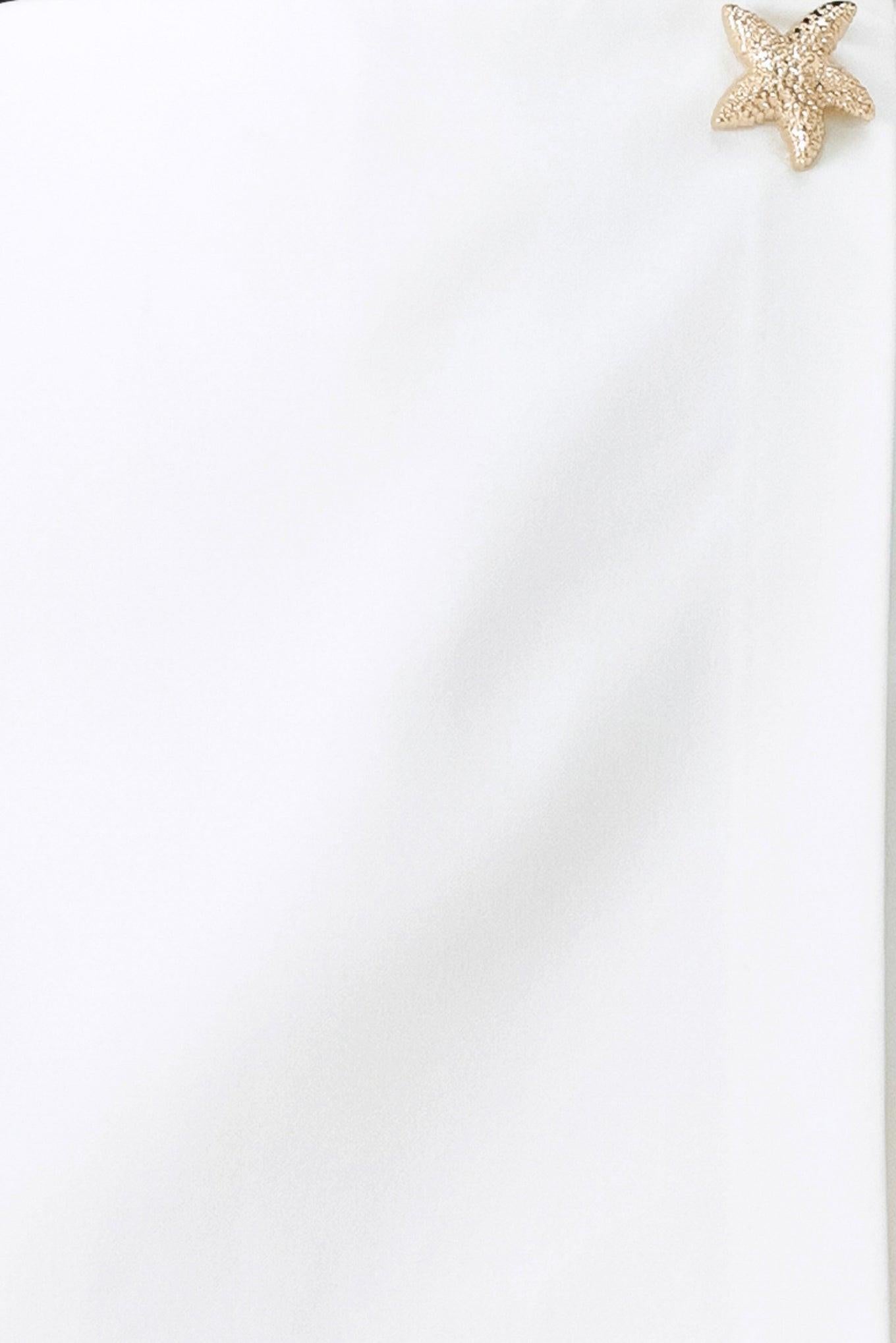 Starfish earring on a white background