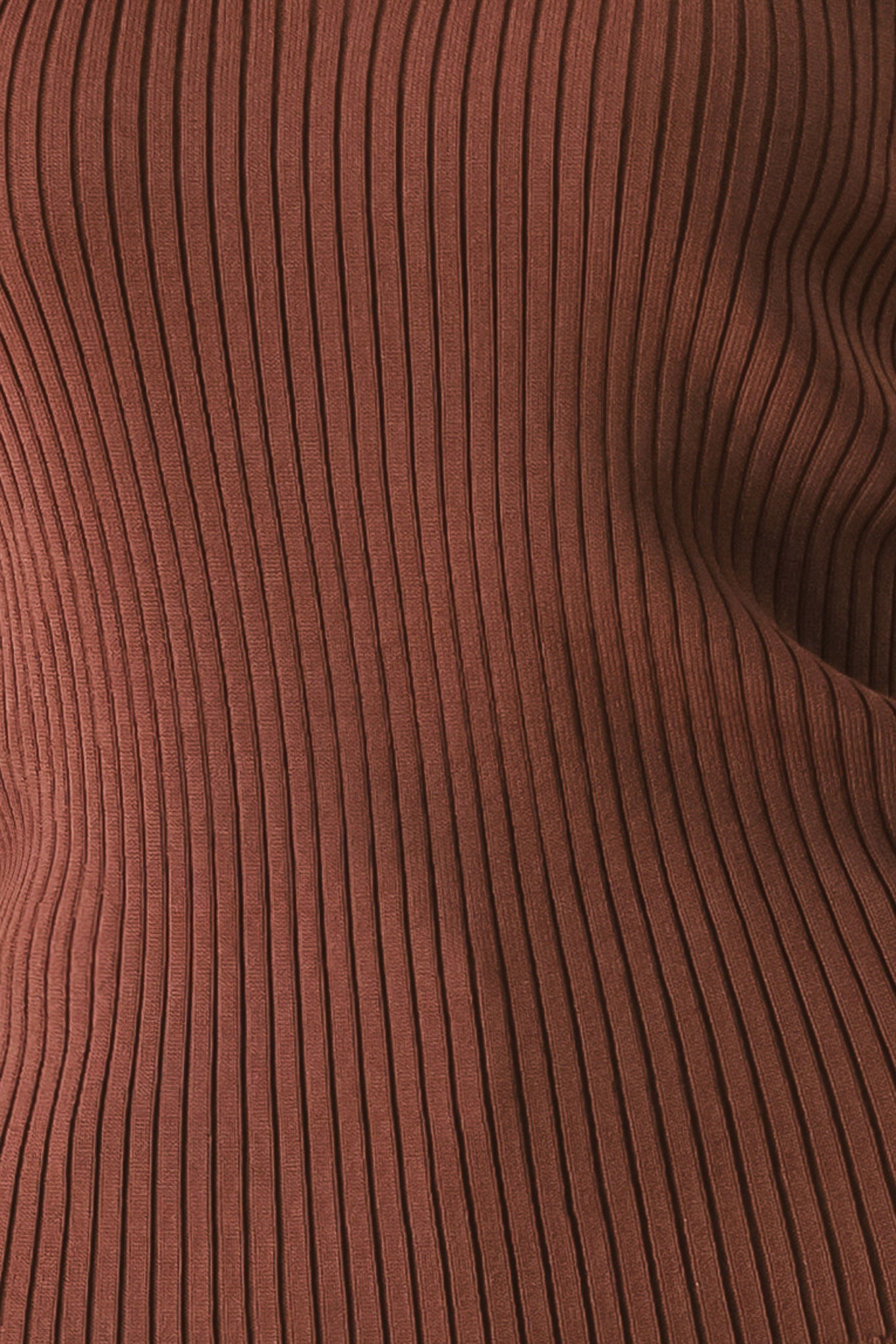 Close-up of brown ribbed fabric texture