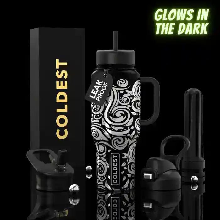 Black water bottle with white patterns, 'Coldest' branding, and 'Glow in the Dark' text on a black background.
