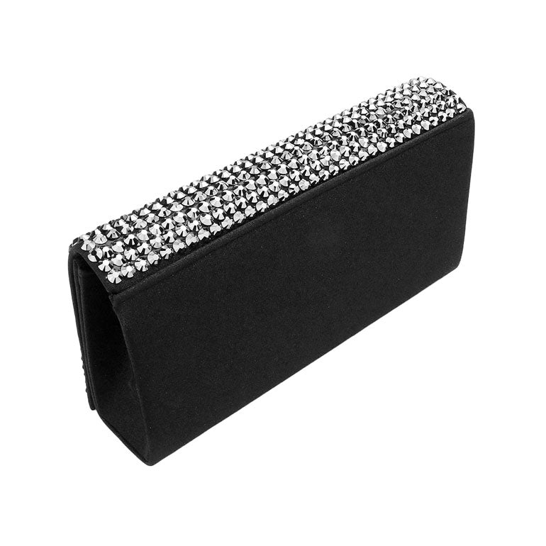 Black clutch bag with silver rhinestone embellishments on a white background