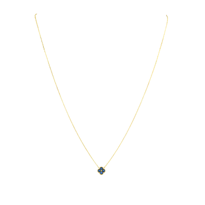 Gold necklace with a blue flower pendant on a white background