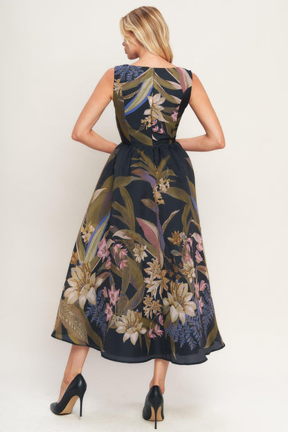 Woman wearing a floral dress with a white background
