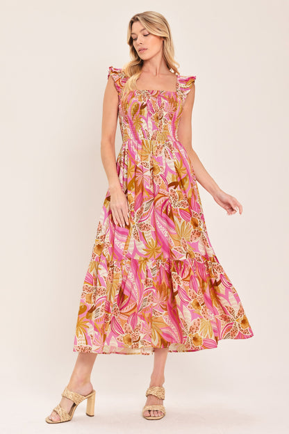 Woman wearing a pink floral dress on a white background