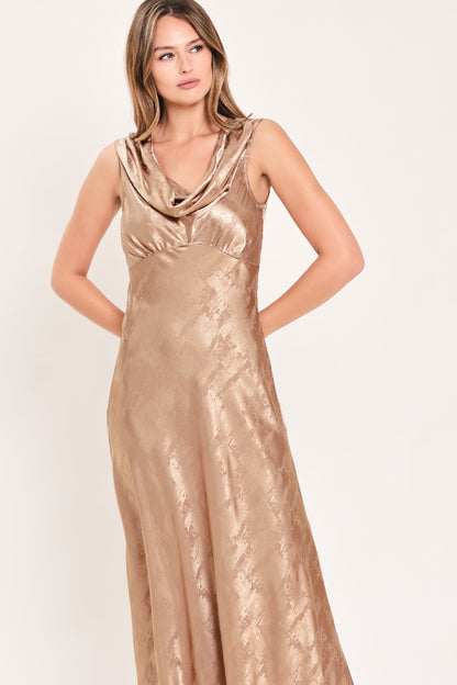 Sleeveless cowl neck gown.