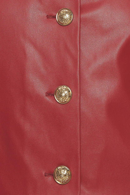 Close-up of a red leather jacket with gold buttons