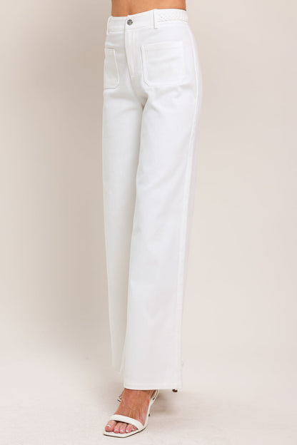 White pants on a plain background