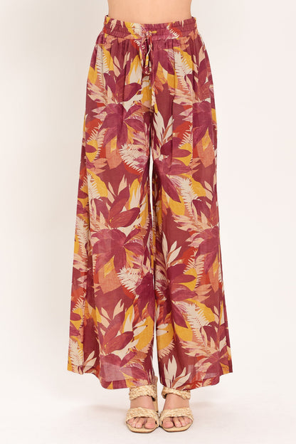 Floral patterned pants on a white background