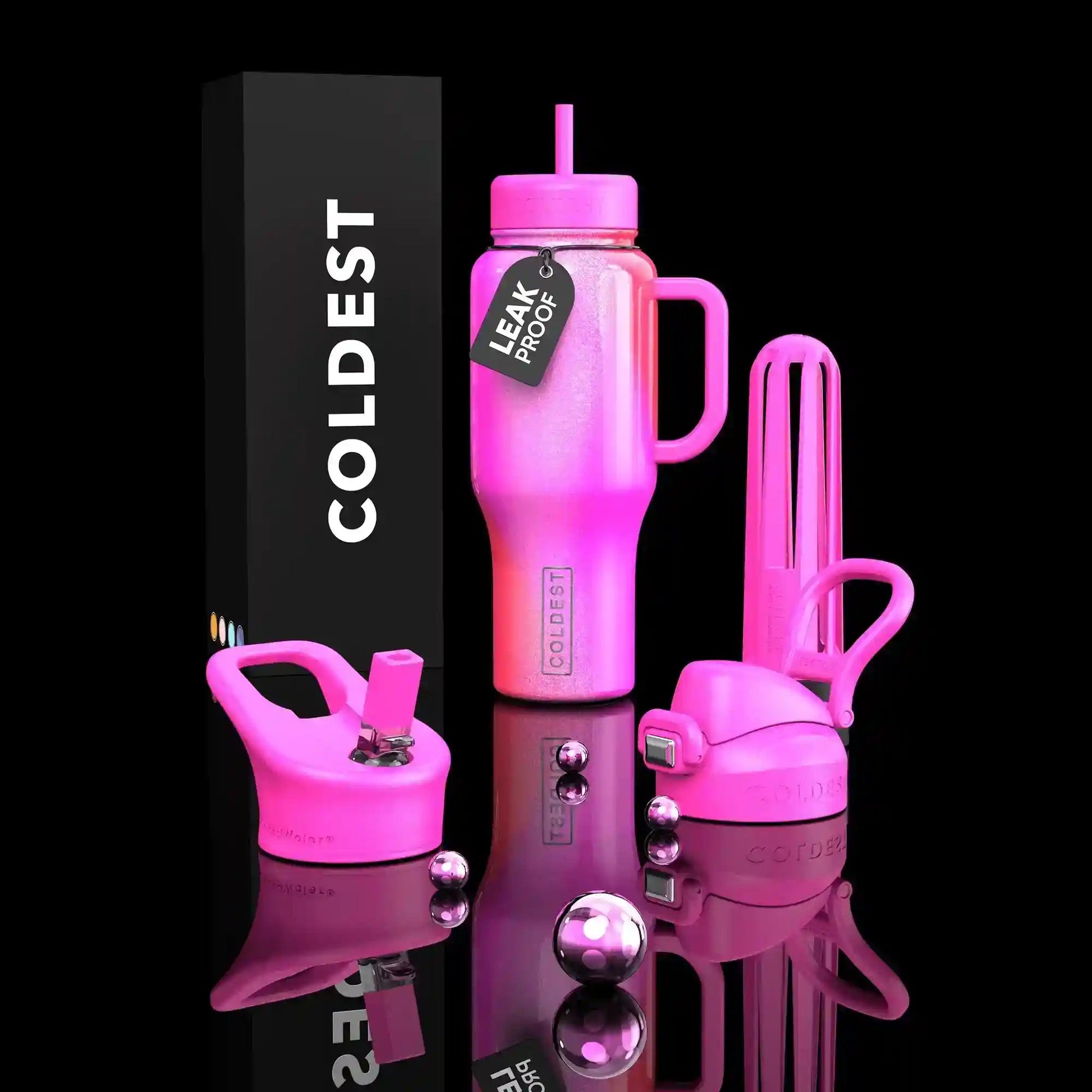 Pink water bottle set with accessories on a reflective surface