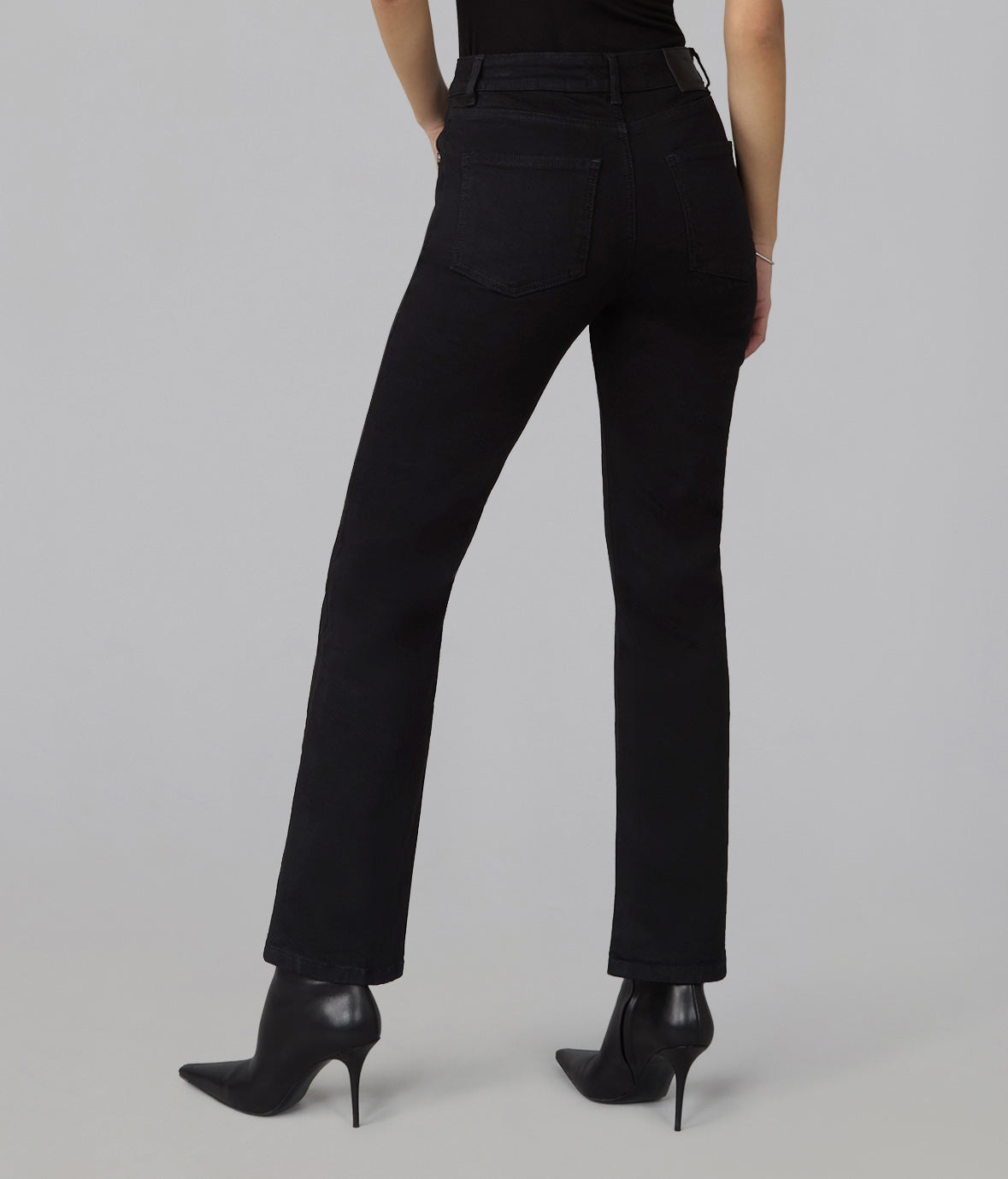 Back view of Denver black high-rise straight-leg jeans showing rear pockets and full-length fit.
